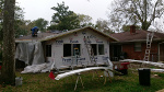 Roofing crew starting work
