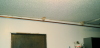 line along ceiling of shop—note pitch